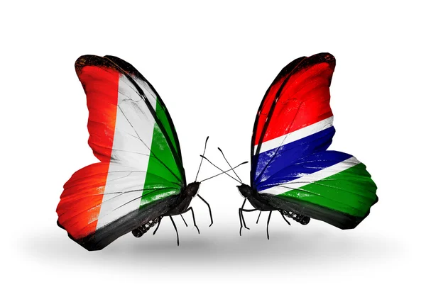 Farfalle con bandiere Cote Divoire e Gambia — Foto Stock