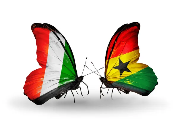 Vlinders met cote divoire en ghana vlaggen — Stockfoto