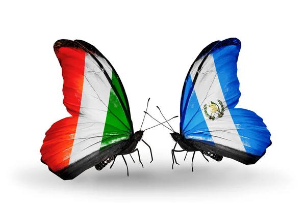 蝴蝶与科特迪瓦疫情和危地马拉的国旗 — 图库照片