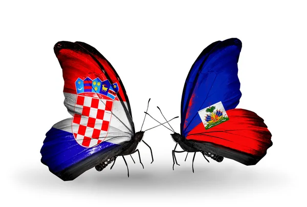 Butterflies with Croatia and Haiti flags — Stock Photo, Image