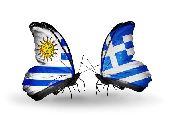 Farfalle con bandiere Uruguay e Grecia — Foto Stock