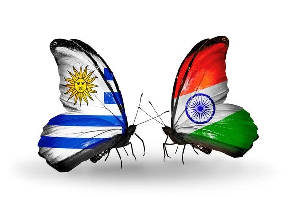 Butterflies with Uruguay and India flags — Stock Photo, Image