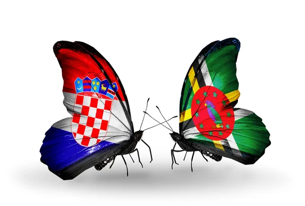 Schmetterlinge mit Kroatien und Dominica-Fahnen — Stockfoto