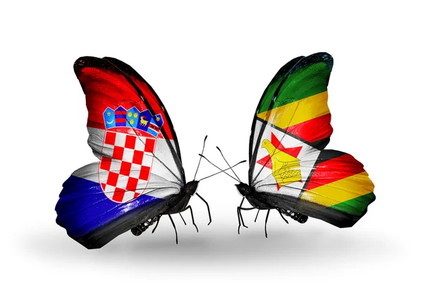 Butterflies with Croatia and Zimbabwe flags — Stock Photo, Image