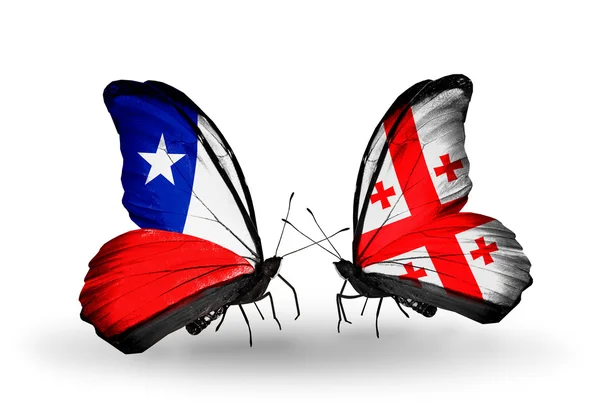 蝴蝶与智利和格鲁吉亚国旗 — 图库照片
