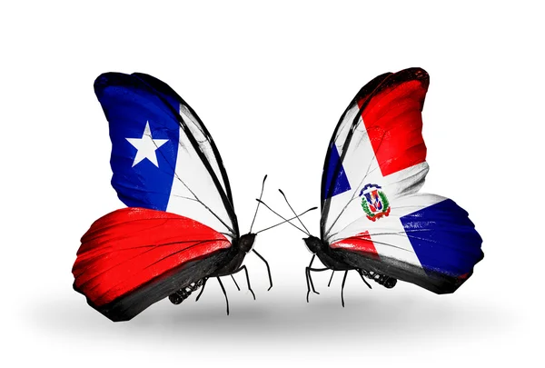 Butterflies with Chile and Dominicana flags — Stock Photo, Image
