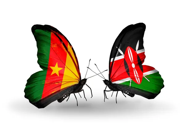 Kamerun ve kenya bayrakları taşıyan kelebekler — Stok fotoğraf