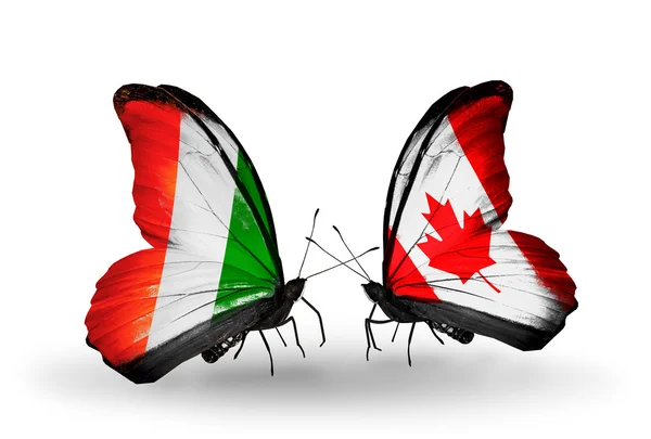 Motýli s příznaky cote divoire a Kanada — Stock fotografie