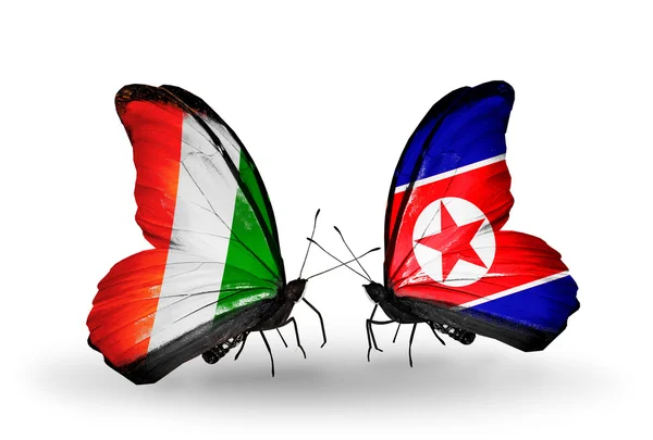Mariposas con Cote Divoire y banderas de Corea del Norte — Foto de Stock