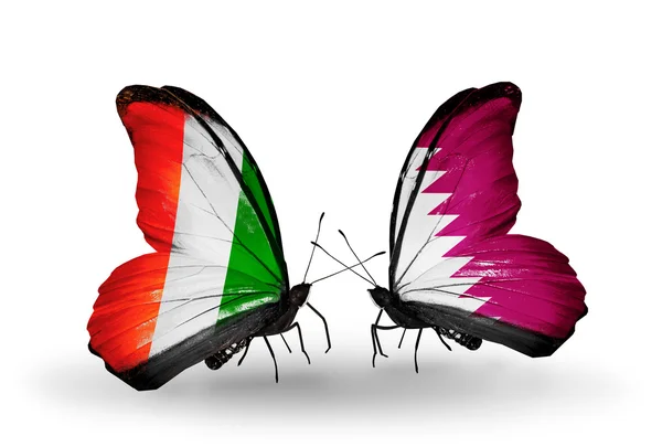 Mariposas con banderas Cote Divoire y Qatar —  Fotos de Stock