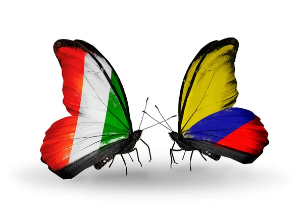 Mariposas con banderas Cote Divoire y Columbia — Foto de Stock