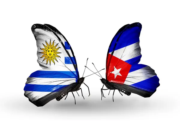 Butterflies with Uruguay and Cuba flags — Stock Photo, Image