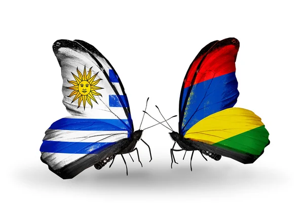 Butterfly dengan bendera Uruguay dan Mauritius — Stok Foto