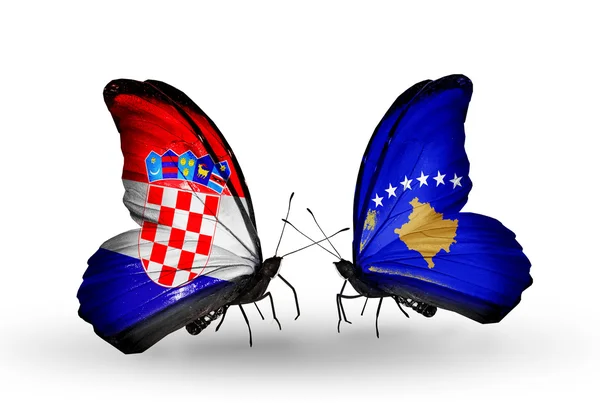 蝴蝶与克罗地亚和科索沃的旗子 — 图库照片