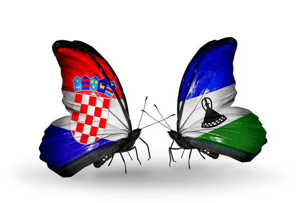Butterflies with Croatia and Lesotho flags — Stock Photo, Image