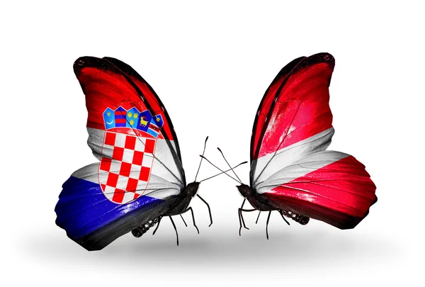 Butterflies with Croatia and Latvia flags — Stock Photo, Image