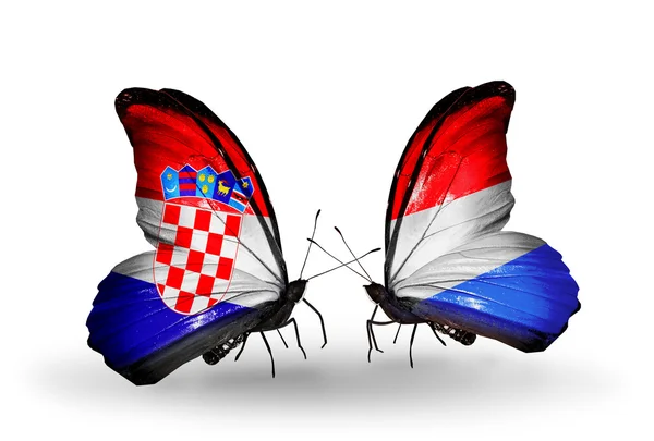 Butterflies with Croatia and Luxembourg flags — Stock Photo, Image