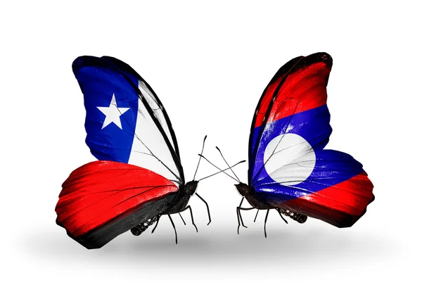 蝴蝶与智利和老挝国旗 — ストック写真