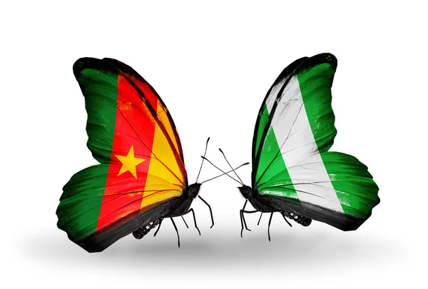 Butterflies with Cameroon and Nigeria flags — Stock Photo, Image