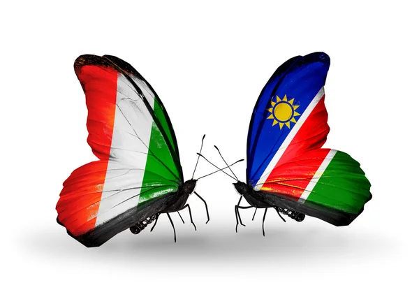 Butterflies with  Cote Divoire and Namibia flags — Stock Photo, Image