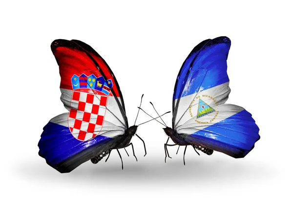 Butterflies with Croatia and Nicaragua flags — Stock Photo, Image
