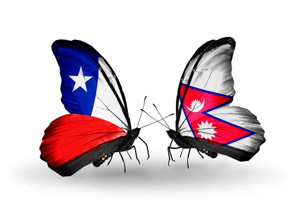 Papillons avec drapeaux du Chili et du Népal — Photo
