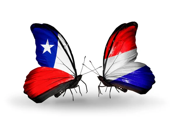 Mariposas con banderas de Chile y Holanda — Foto de Stock