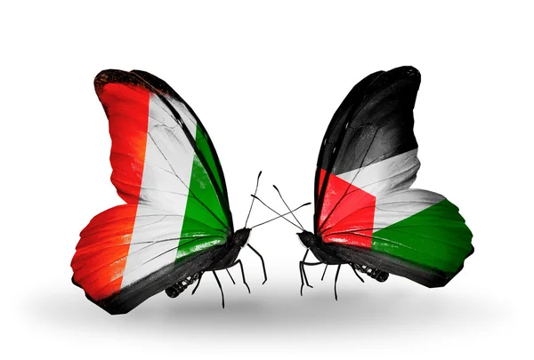 Butterflies with  Cote Divoire and Palestine flags — Stock Photo, Image