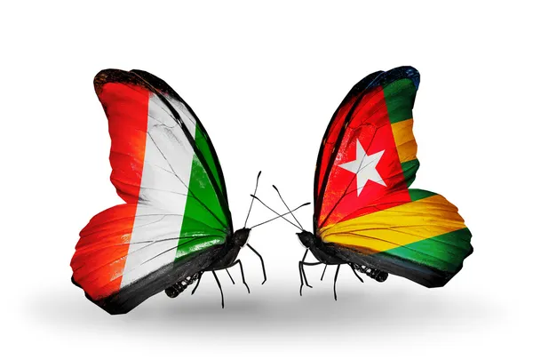 Butterflies with Cote Divoire and  Togo flags — Stock Photo, Image