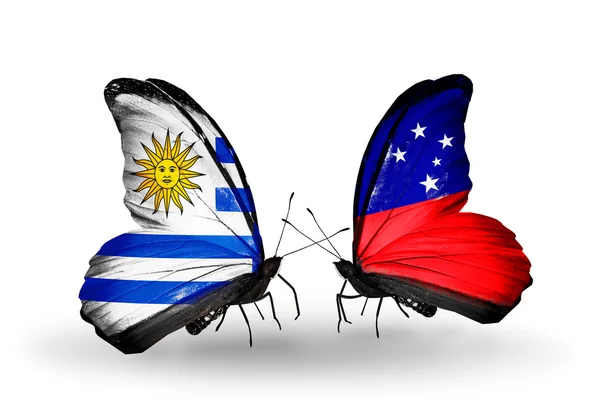 Butterflies with Uruguay and Samoa flags — Stock Photo, Image