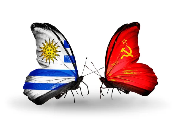 Butterflies with Uruguay and Soviet Union flags — Stock Photo, Image