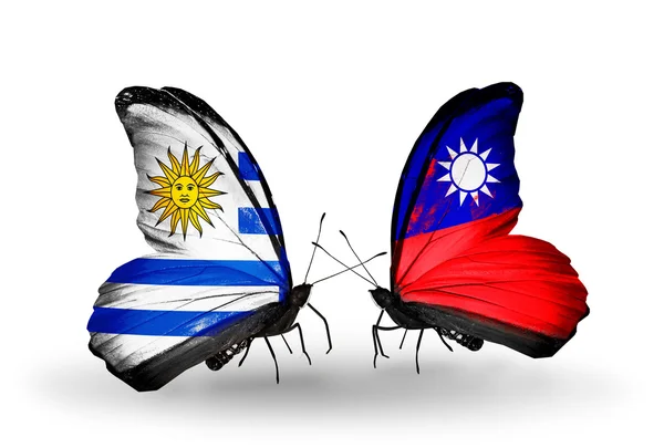 Butterflies with Uruguay and Taiwan flags — Stock Photo, Image