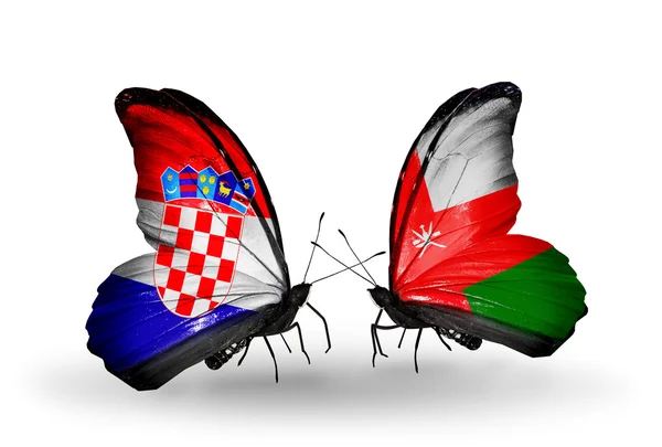Butterflies with Croatia and Oman flags — Stock Photo, Image