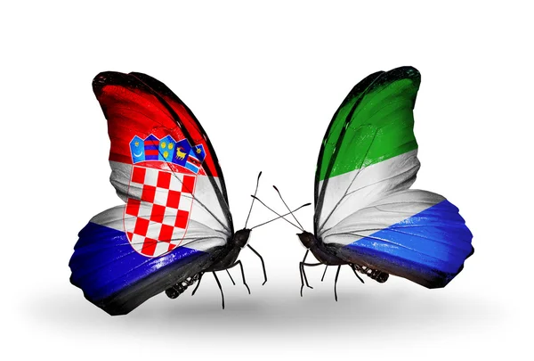 Бабочки с флагами Хорватии и Сьерра-Леоне — стоковое фото