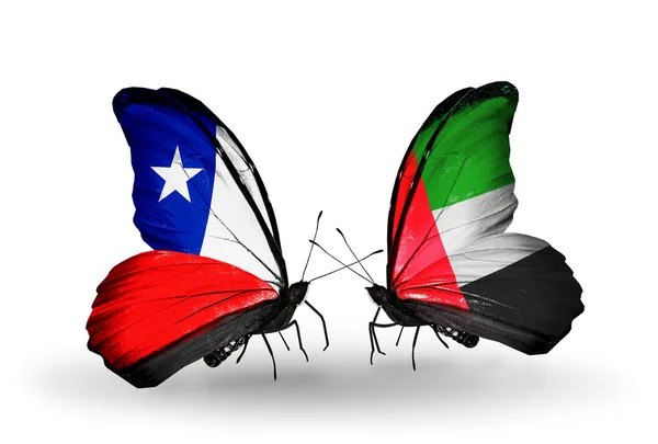 Butterflies with Chile and United Arab Emirates flags — Stock Photo, Image