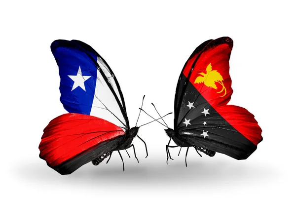 Butterflies with Chile and Papua New Guinea flags — Stock Photo, Image