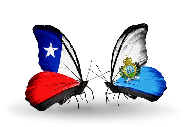 Butterflies with Chile and San Marino flags — Stock Photo, Image