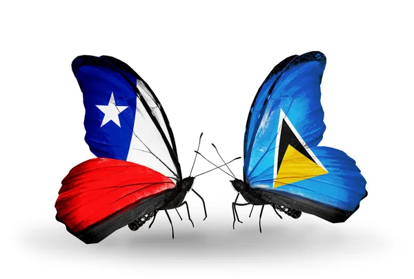 Butterflies with Chile and Saint Lucia flags — Stock Photo, Image