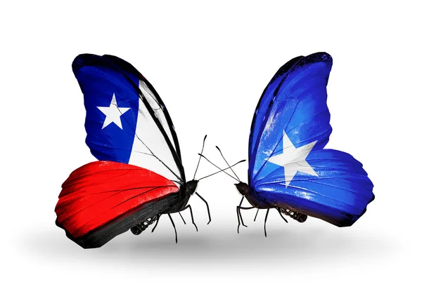 Butterflies with Chile and Somalia flags — Stock Photo, Image