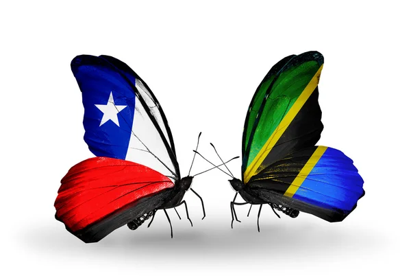 Farfalle con bandiere Cile e Tanzania — Foto Stock