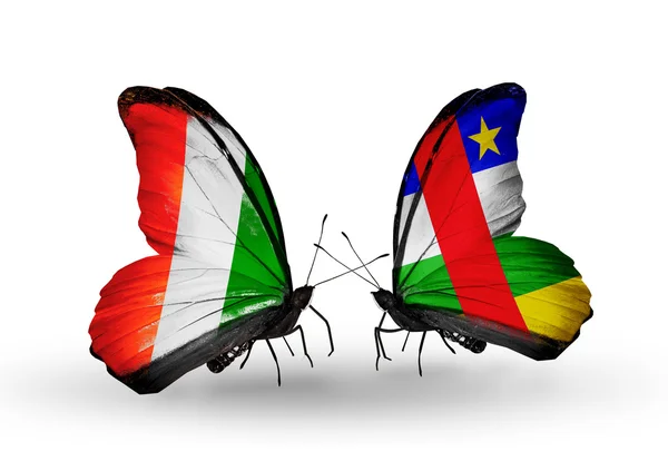 蝴蝶与科特迪瓦疫情和中非共和国国旗 — 图库照片