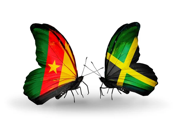 Butterflies with Cameroon and Jamaica flags — Stock Photo, Image