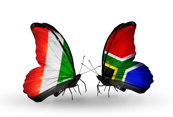 Butterflies with Cote Divoire and South Africa flags — Stock Photo, Image