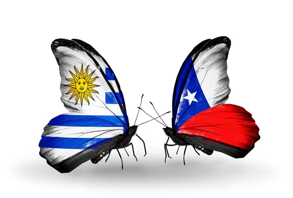 Butterflies with Uruguay and Chile flags — Stock Photo, Image