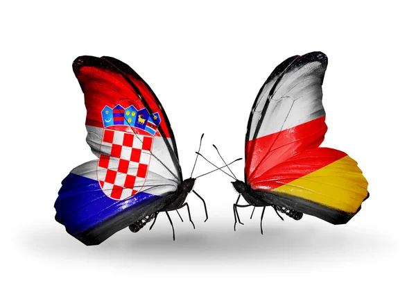 Borboletas com bandeiras da Croácia e da Ossétia do Sul — Fotografia de Stock