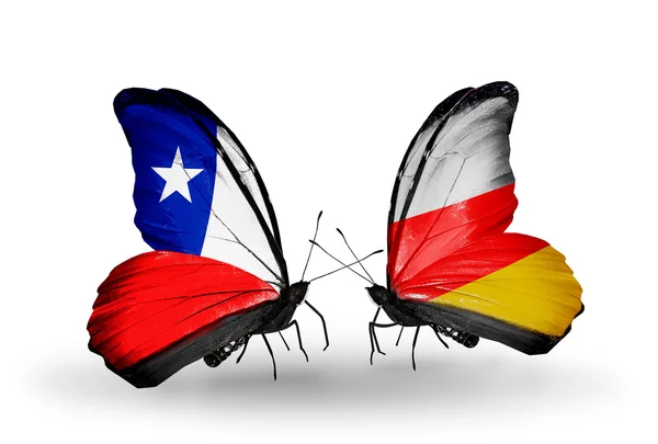 Butterflies with Chile and South Ossetia flags — Stock Photo, Image