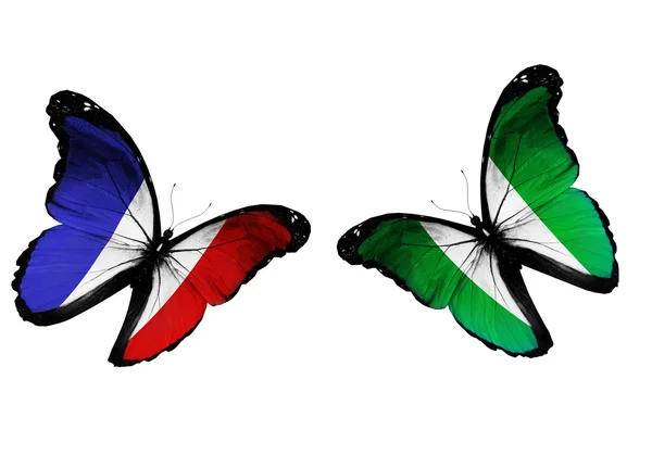 Butterflies with France and Nigeria flags — Stock Photo, Image