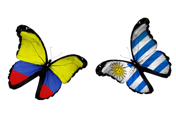 Papillons avec drapeaux Columbia et Uruguay — Photo