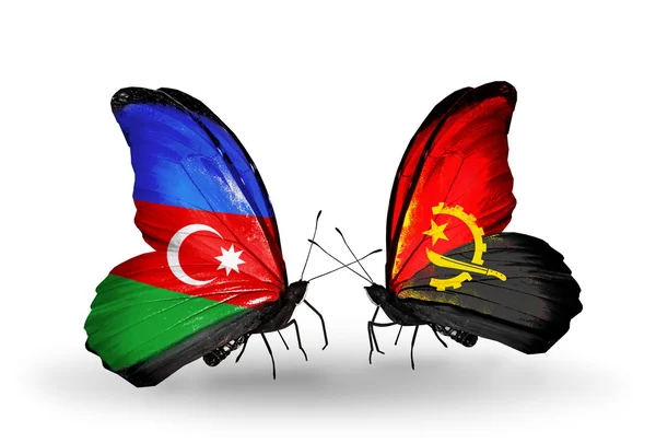 Borboletas com bandeiras do Azerbaijão e Angola em asas — Fotografia de Stock