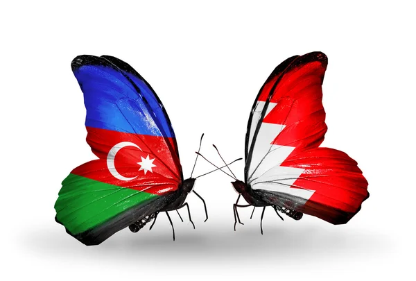 蝴蝶翅膀上的阿塞拜疆和巴林标志 — 图库照片
